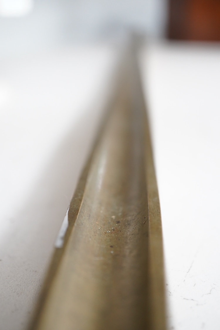 A George IV Imperial brass yard stick, engraved with County of Surrey 1825, with official stamps and crowned VR, etc.